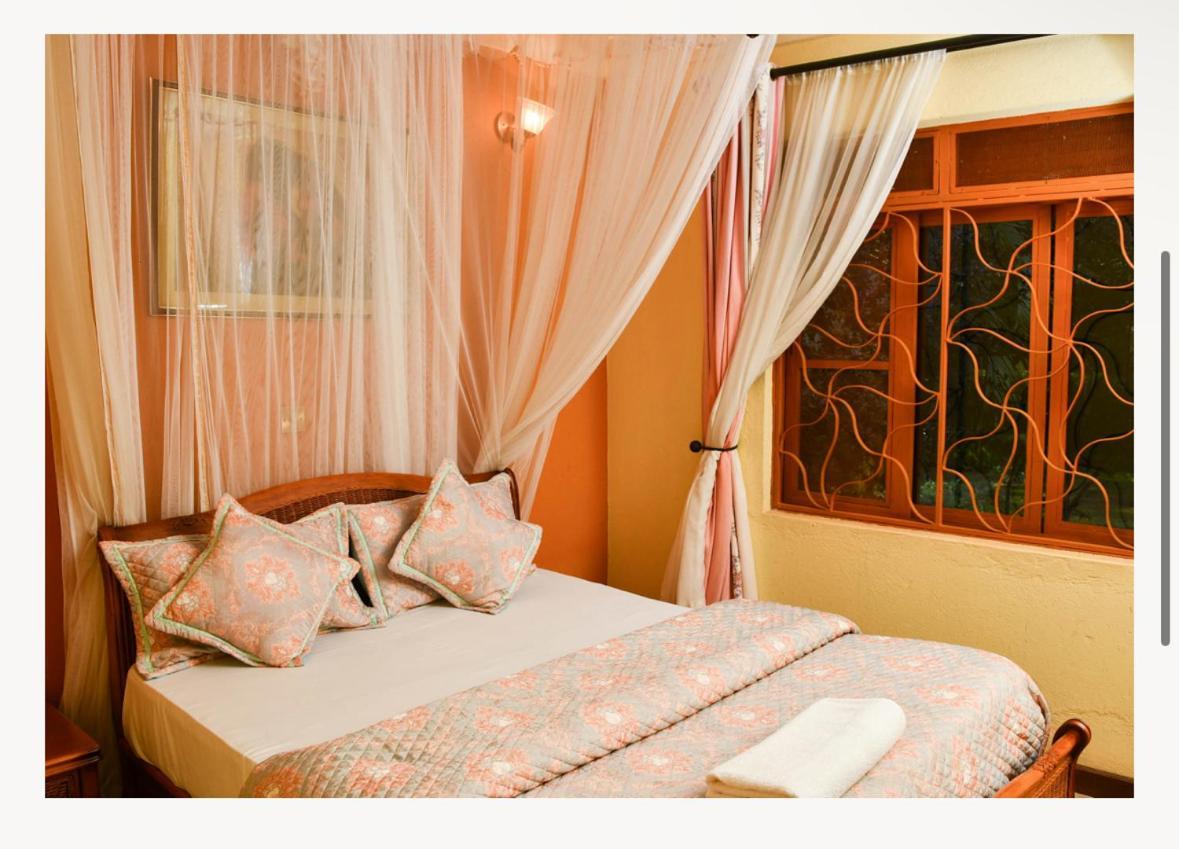Country Lake Resort Garuga Entebbe Buitenkant foto